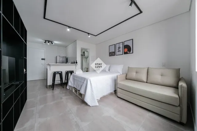 Flat moderno com sala e cozinha americana em condomínio fechado de Alphaville